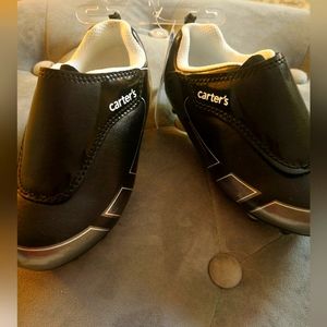 Outdoor Kids Cleats in Black with tags